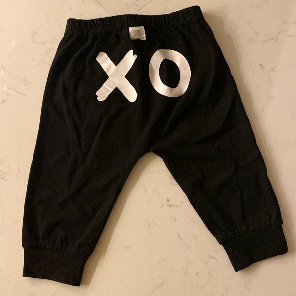 Stephan baby pants 6-12 months. Black with XO on back